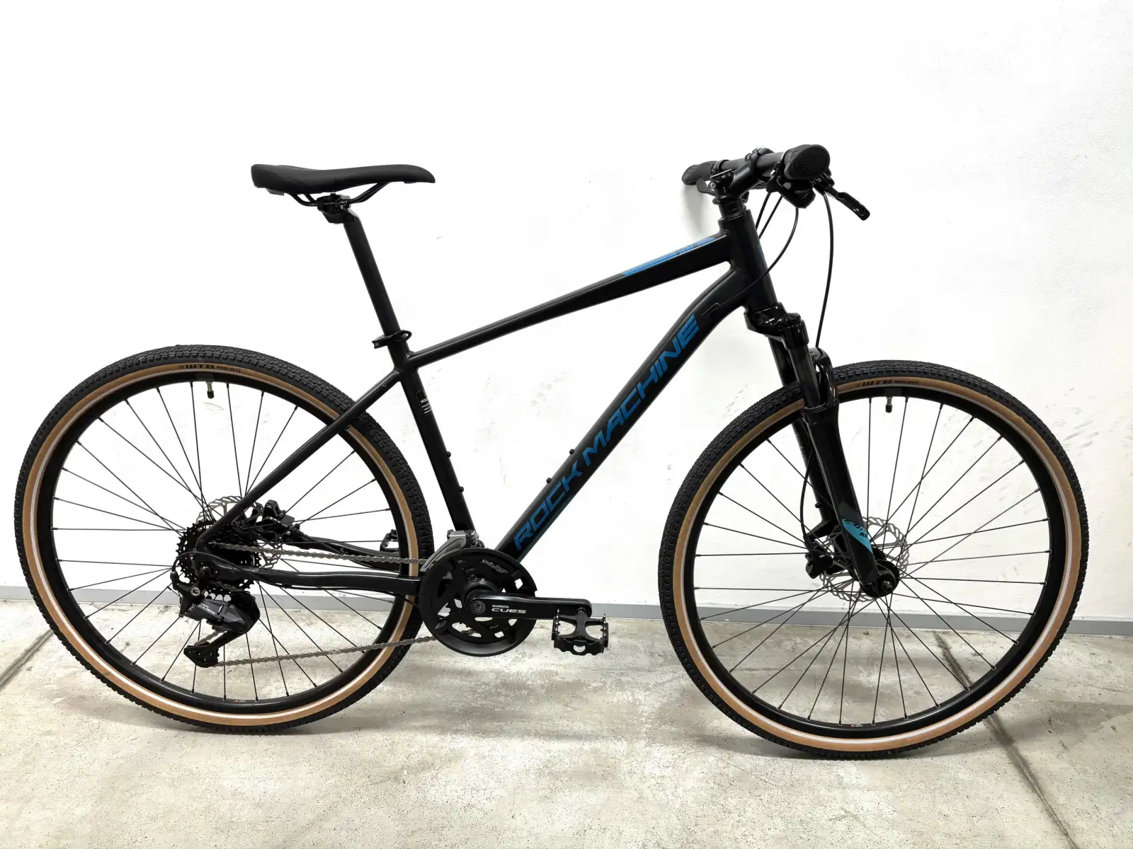 Rock Machine CrossRide 700 trekkingowy rower black/petrol PRÓBKA