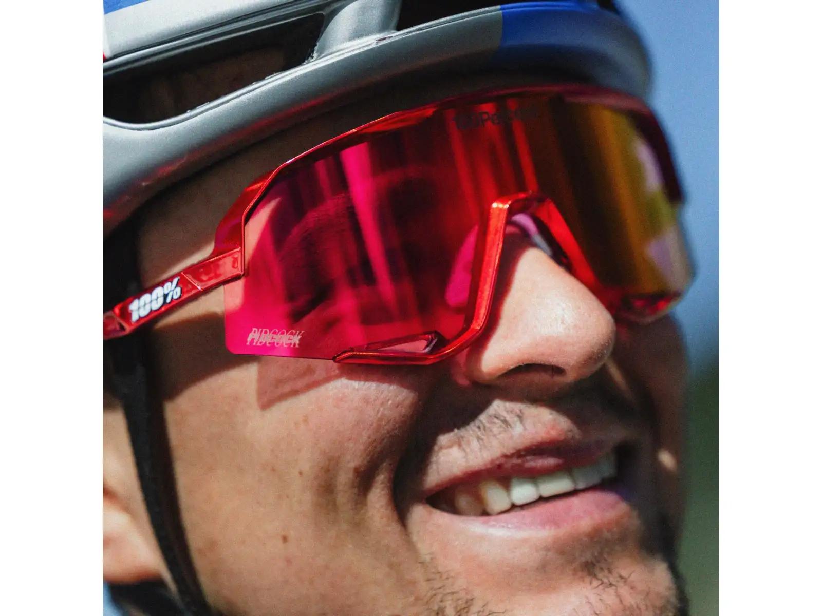 100% Slendale Pidcock Le okulary rowerowe Gloss Red Holographic HiPER Red Mirror Lens